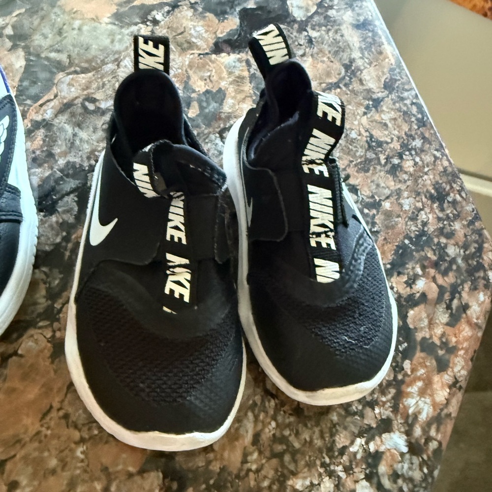 Nike Kids Black and White Slip-On Sneakers